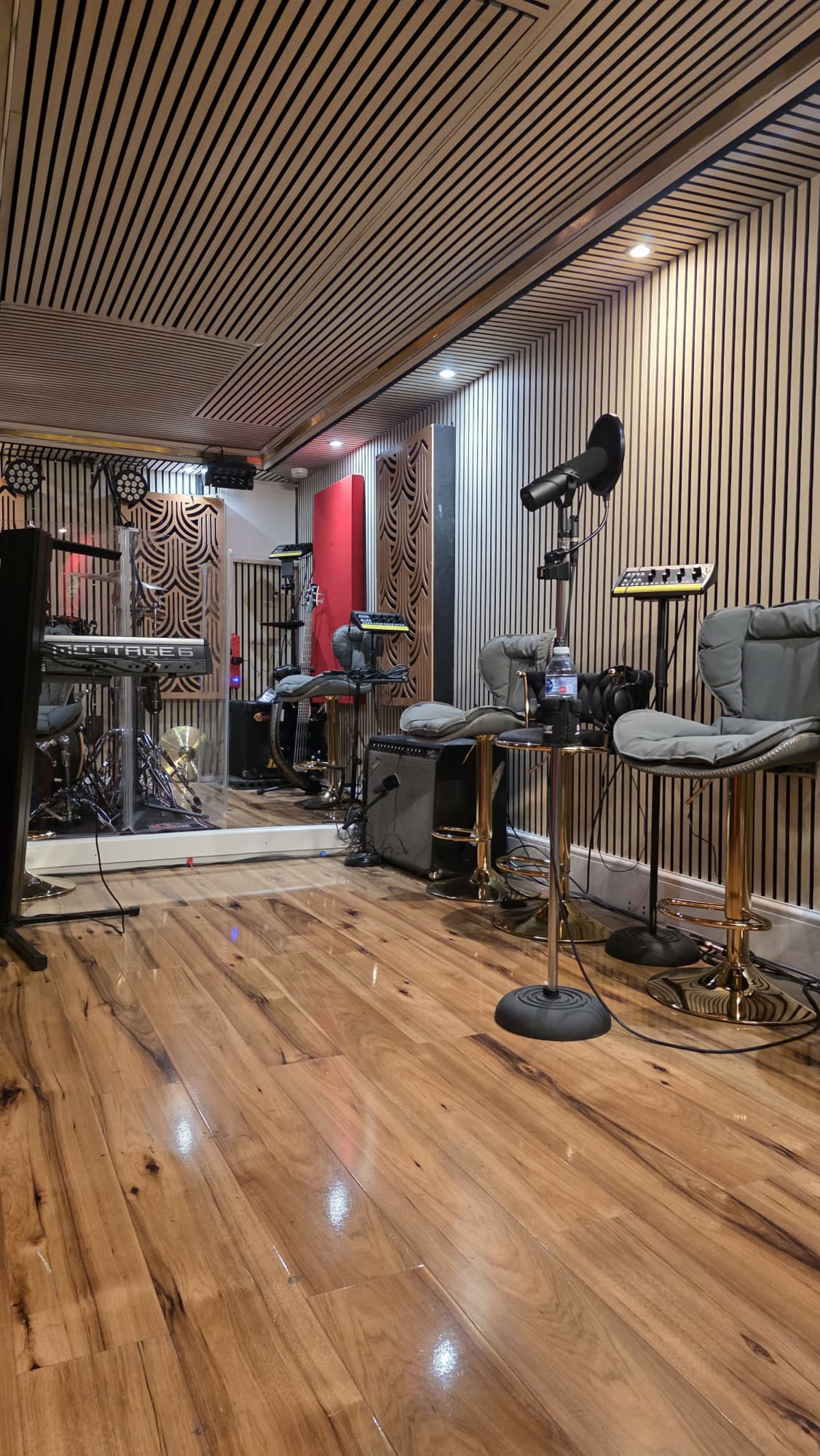 Live room — band setup with drum booth